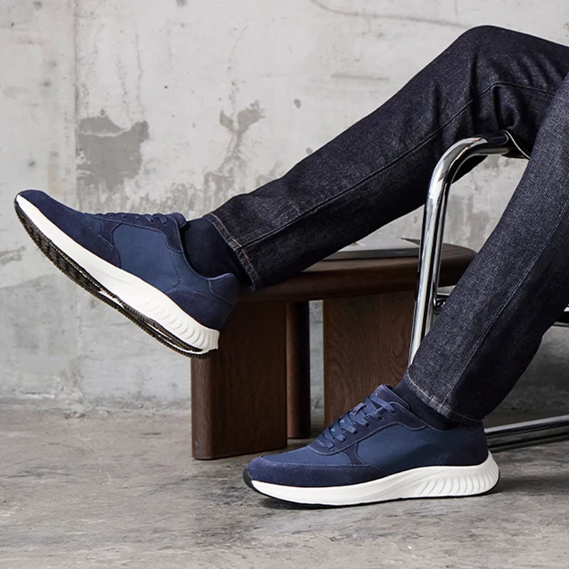 model wearing The Axis in Cobalt Suede