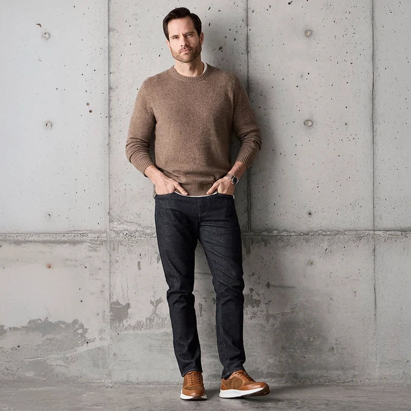 model wearing The Axis Grizzly with dark jeans and light brown sweater