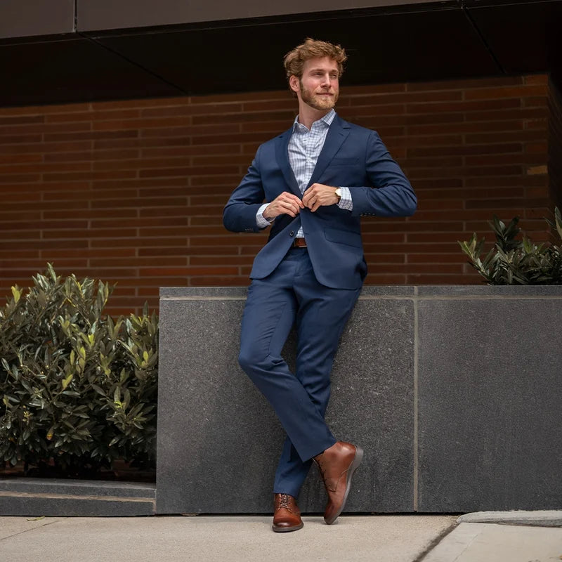 Chukka Chestnut & Mocha on model with navy suit