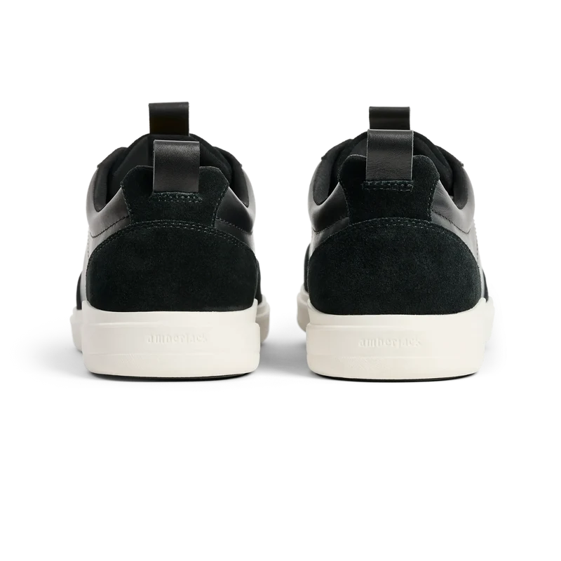 The Court in Onyx leather & suede back heel view