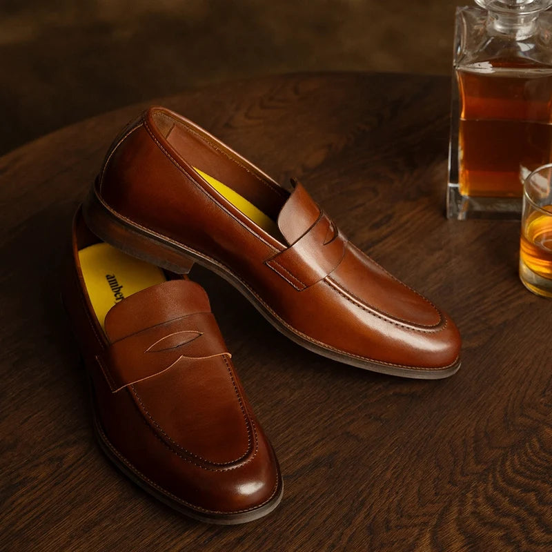 The Duke in Chestnut brown full-grain leather detail photo on table