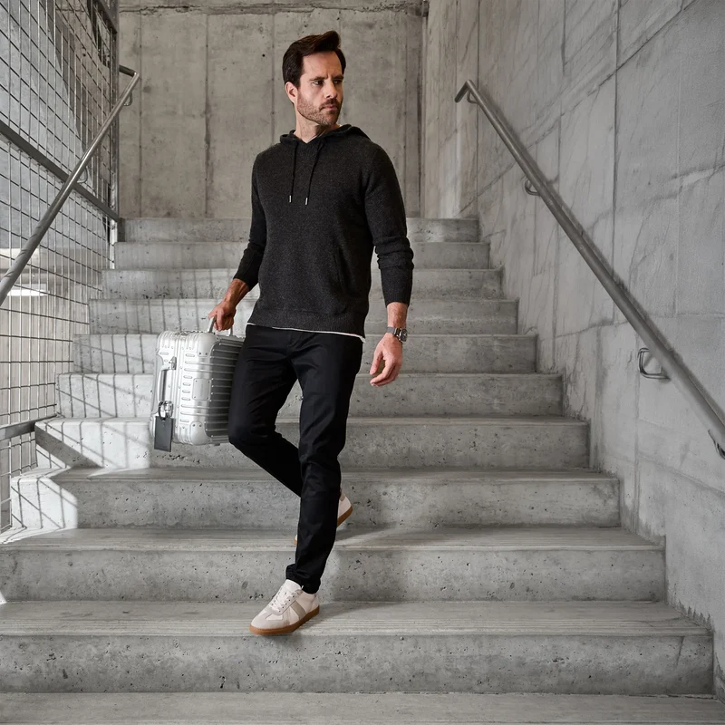 Model wearing The GAT in Ivory full grain leather & suede with dark pants