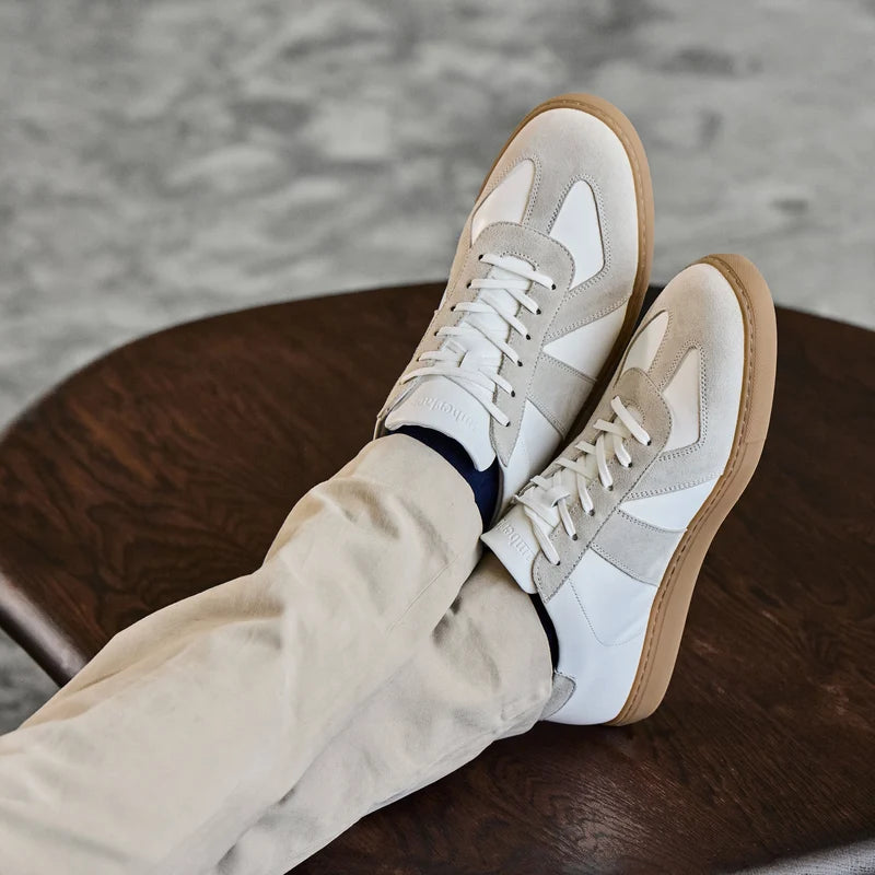 model wearing The GAT in Ivory full grain leather & suede with khaki pants