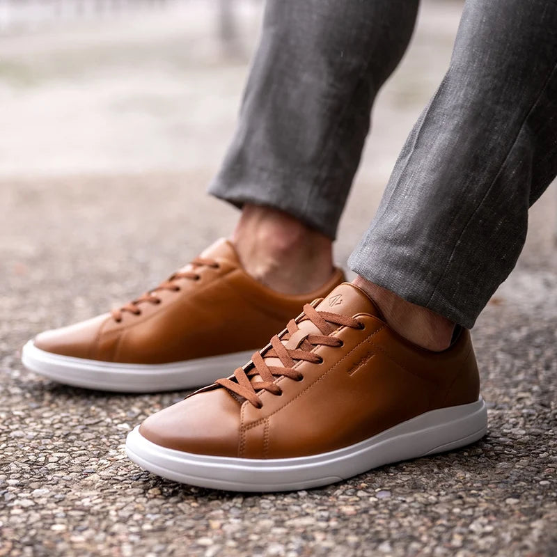 The Low-Top in Honey tan leather by Amberjack - worn by model with gray dress pants