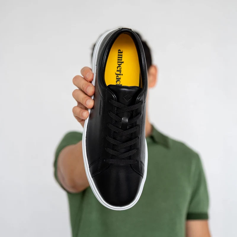 Model holding up The Low-Top Onyx