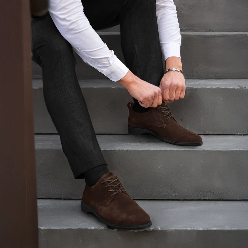 model wearing the OG Walnut dark brown suede