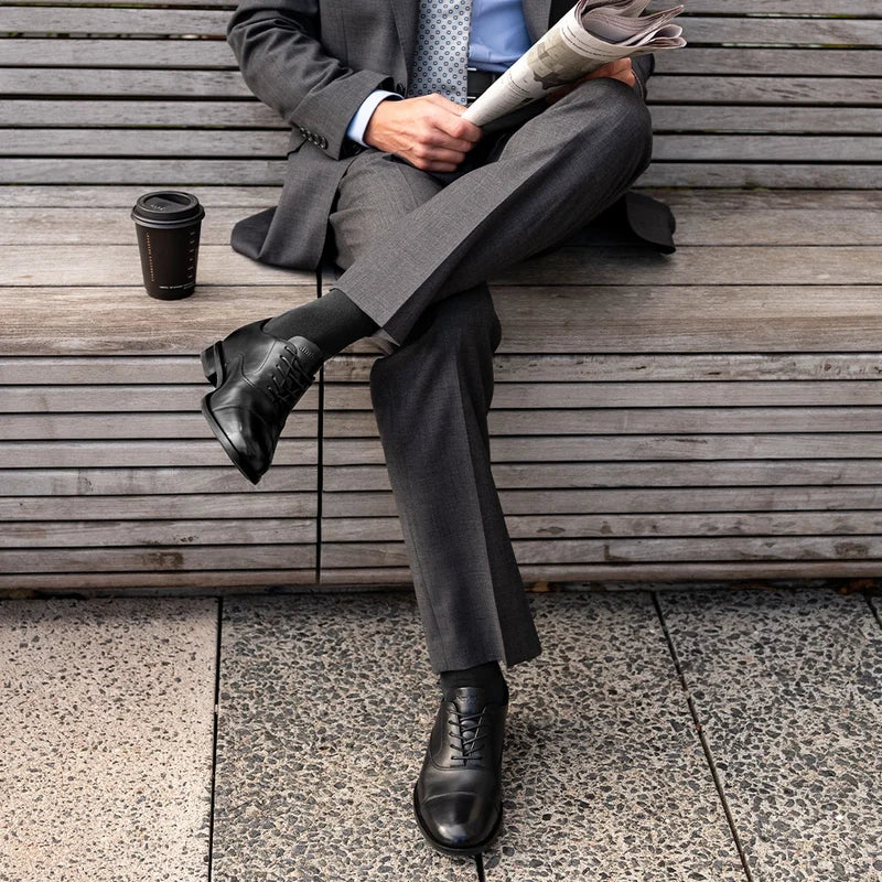 model wearing The Regent in Obsidian paired with dark gray suit