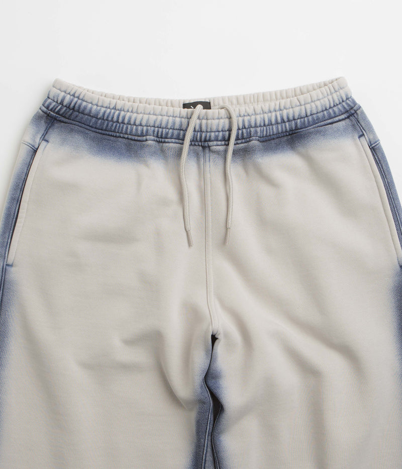 The Trilogy Tapes Overdye Open Hem Sweatpants in Grey and Blue