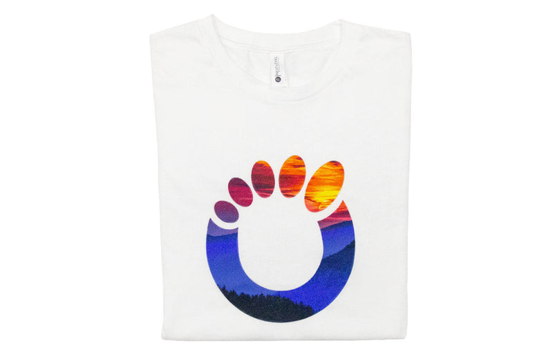 Xero Shoes O-Toes Logo in Front of White T-Shirt