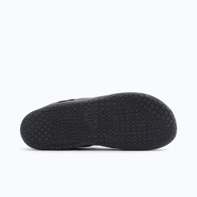 Xero Shoes XT Max Men Shoe in Black with Black Outsole and Toe Facing Right
