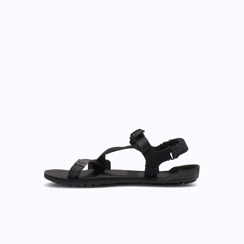 Xero Shoes Z-Trail - Big Kids Sandal in Black with Toe Facing Left