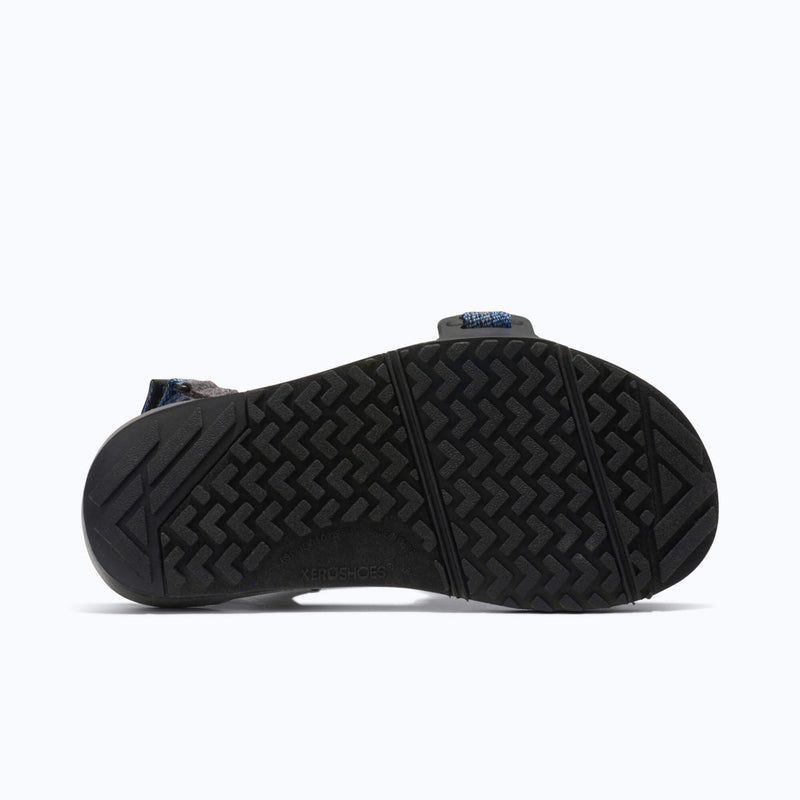 Xero Shoes Z-Trail Big Kids Sandal in Blue with the outsole facing back and the toe facing right.